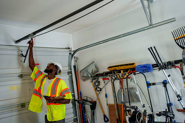 Professional Garage Door Panel Replacement technician working in Marlboro, NY